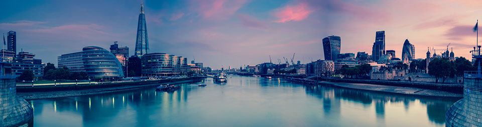 Panoramic view on London and Thames at twilight, from Tower Bridge