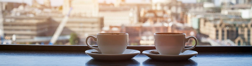 Cafe with view of London, two cups of coffee and St Paul's Cathedral
